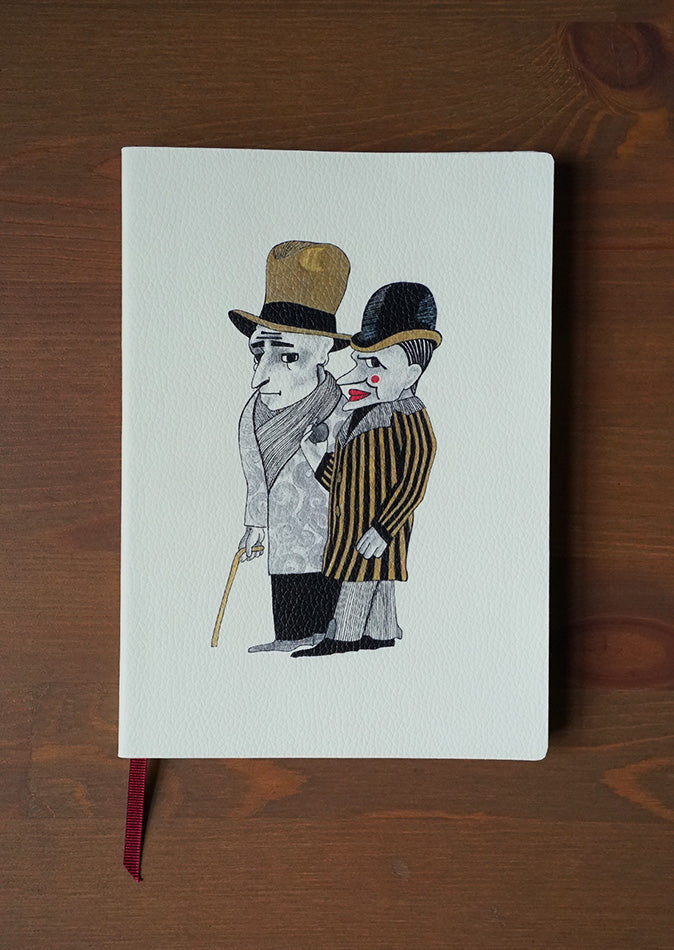 An ivory coloured  notebook with a design on the cover. Two men in top hats strolling. Colours of the illustration include golden, black,  greyscale and details in red. 